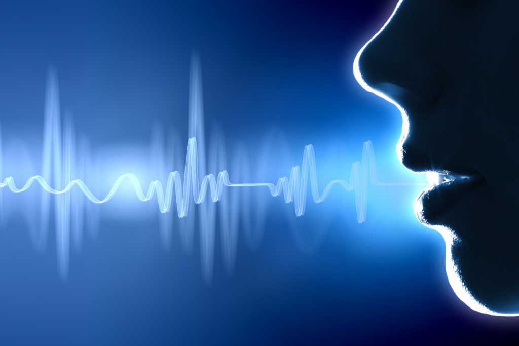 Profile of a woman with sound wave coming from her mouth.
