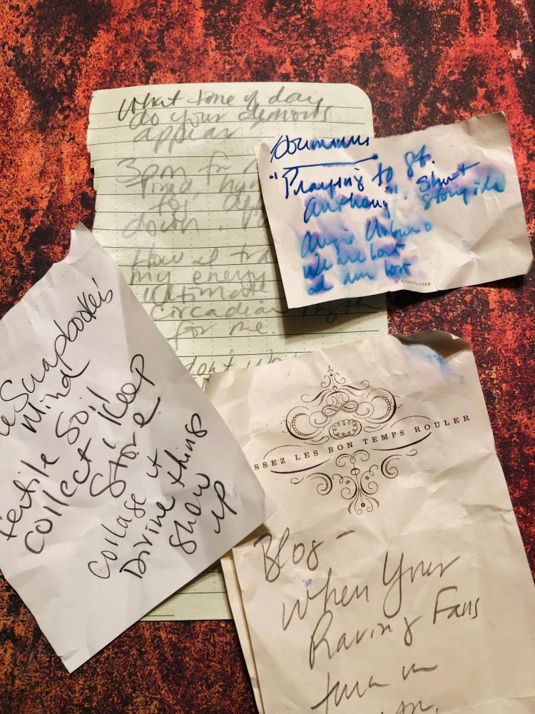 A collection of four hand-written notes.