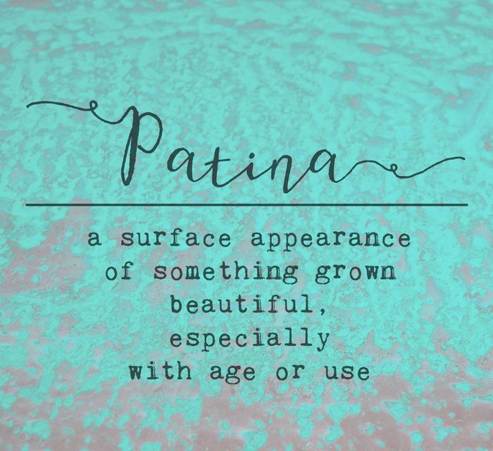 A textured surface with the words "Patina, a surface appearance of something grown beautiful, especially with age or use".