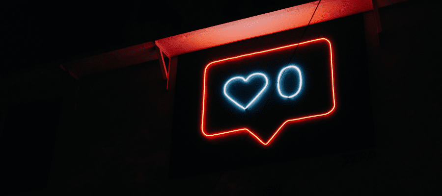 Neon Instagram "Like" Button symbolizing how to increase social media engagement