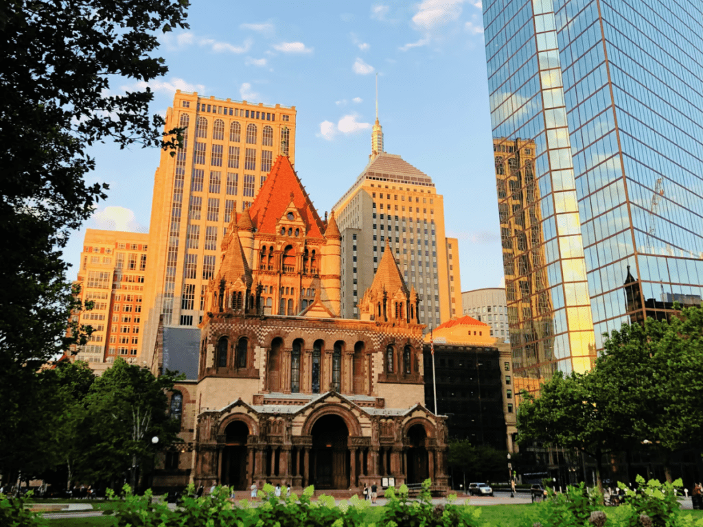 Photo of Boston's Trinity Church during sunset's golden hour to represent your creative golden hour and best energy levels