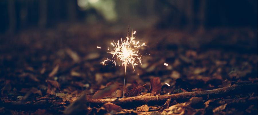 A sparkler in the woods symbolizes immersing yourself in the beauty and inspiration of nature and playfulness, as a means to feel better when you’re feeling burnt out.