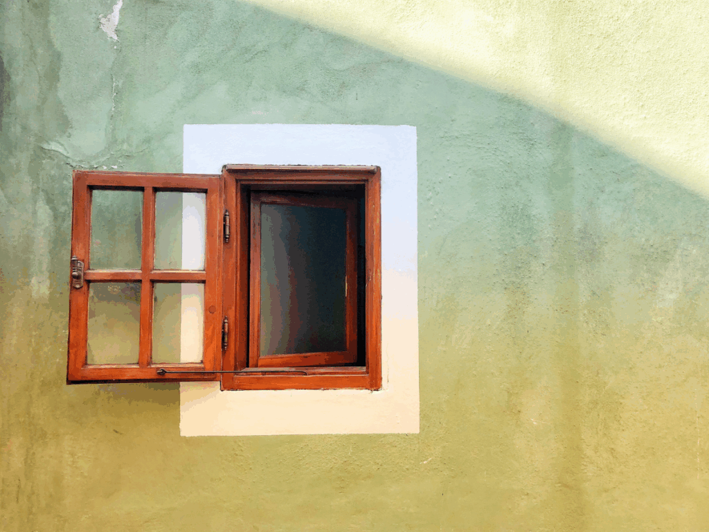 fresh start; a window opened just a crack symbolizes opening ourselves up to a fresh start when life feels stale